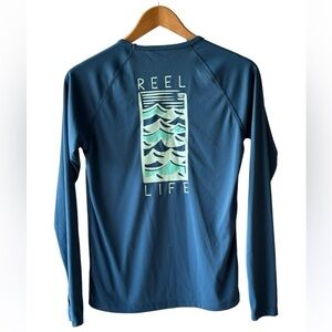 Ladies Reel life rash guard size small blue color new tag long sleeve no tag